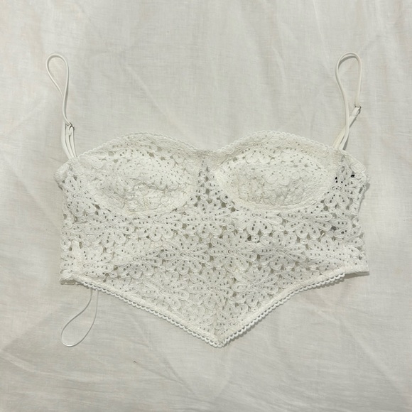 Tops - White lace going out top with a V hem and adjustable bow tie in the back.